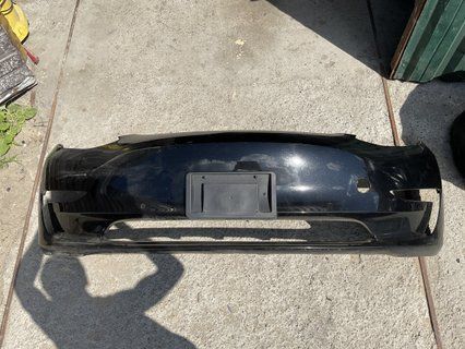 Бампер передній під парктроніки голий Tesla Model 3 18-21 під фарбування 1084168-S0-Y фото