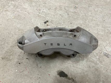 Суппорт передній лівий Tesla Model Y 20- 1044621-00-E фото
