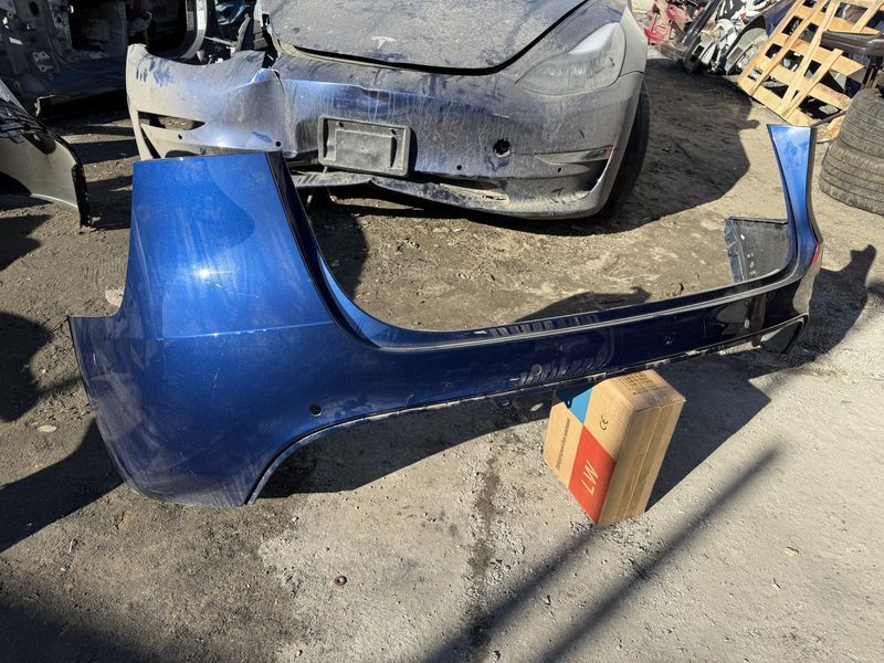 Задній бампер Tesla Model Y 20-22 під парктроніки голий 1487995-00-B фото