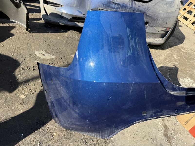 Задній бампер Tesla Model Y 20-22 під парктроніки голий 1487995-00-B фото